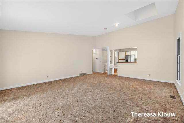 Builiding view twenty one for 17496 Meadow Wood, Spring Lake, MI. 49456