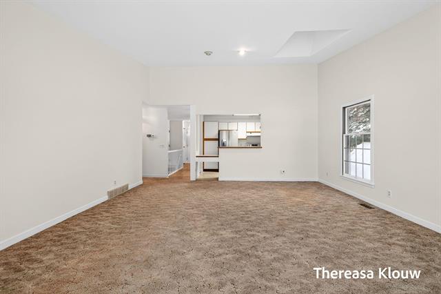 Builiding view twenty for 17496 Meadow Wood, Spring Lake, MI. 49456