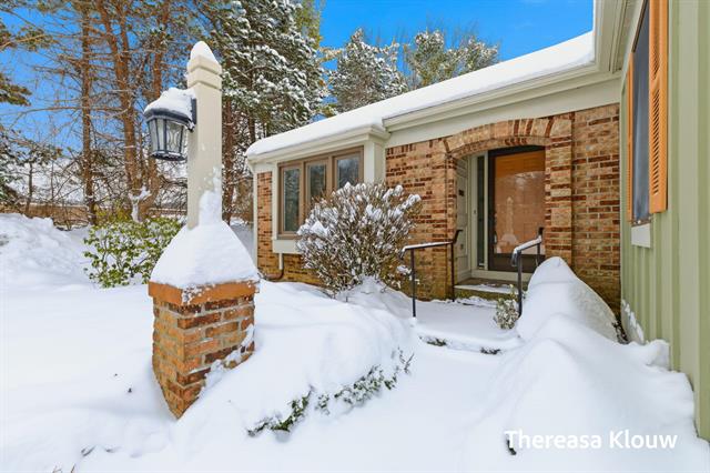 Builiding view two for 17496 Meadow Wood, Spring Lake, MI. 49456