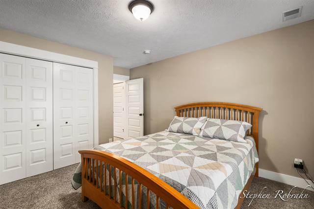 Builiding view thirty for 885 Cooks Crossing, Byron Center, MI. 49315