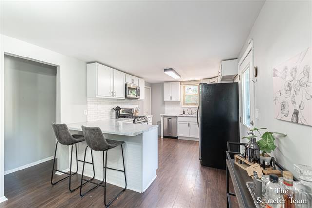 Builiding view fourteen for 8338 Fulton, Ada, MI. 49301