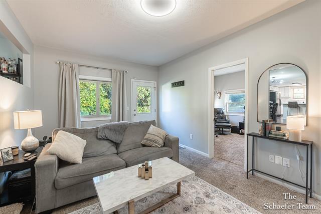 Builiding view ten for 8338 Fulton, Ada, MI. 49301