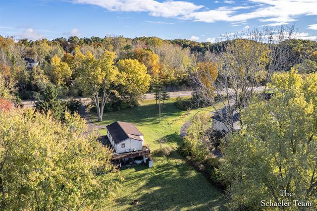 Builiding view thirty two for 8338 Fulton, Ada, MI. 49301