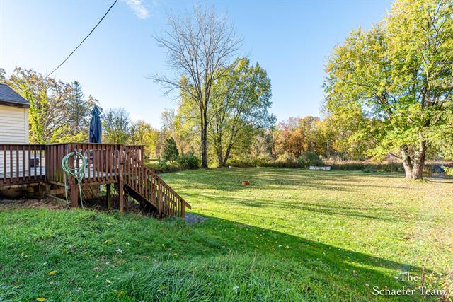 Builiding view thirty for 8338 Fulton, Ada, MI. 49301