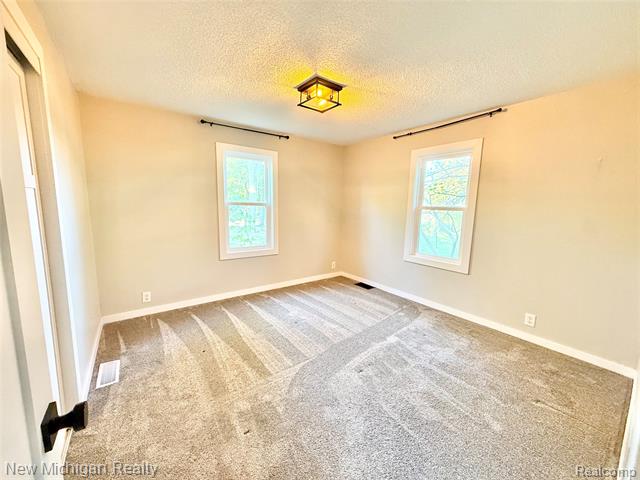 Builiding view sixteen for 823 Silver Lake, Fenton, MI. 48430