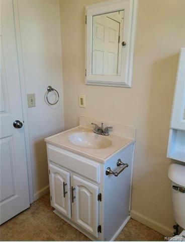 Builiding view six for 822 Isham Street, Owosso, MI. 48867