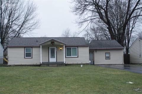 front view for 1450 Transue Avenue, Burton, Mi. 48509