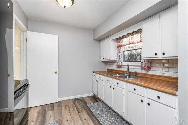 Builiding view four for 105 Washington Street, Clio, MI. 48420