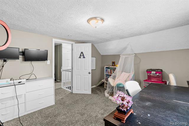 Builiding view twenty four for 102 Elms, Durand, MI. 48429