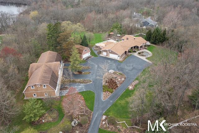 front view for 3439 Quiggle Avenue Se, Ada, Mi. 49301