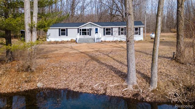 front view for 3049 Mcconnell Hwy, Charlotte, Mi. 48813