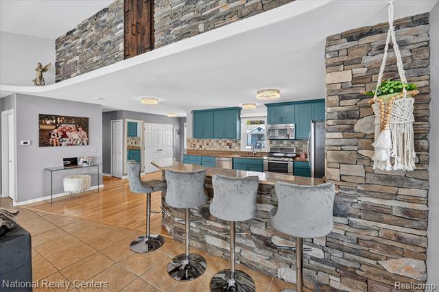 Builiding view sixteen for 560 Black Oaks, Howell, MI. 48843