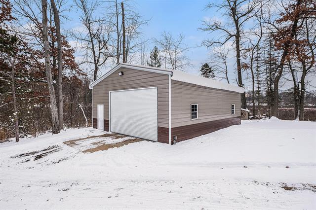 Builiding view fifty two for 10550 Holland Lake Rd., Greenville, MI. 48838