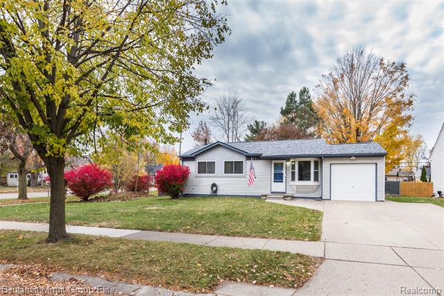 front view for 115 Wellington Dr, South Lyon, Mi. 48178