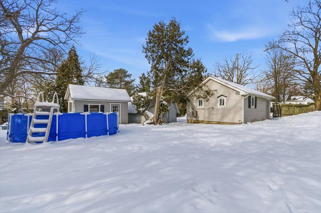 Builiding view forty three for 439 N Reese, South Lyon, MI. 48178