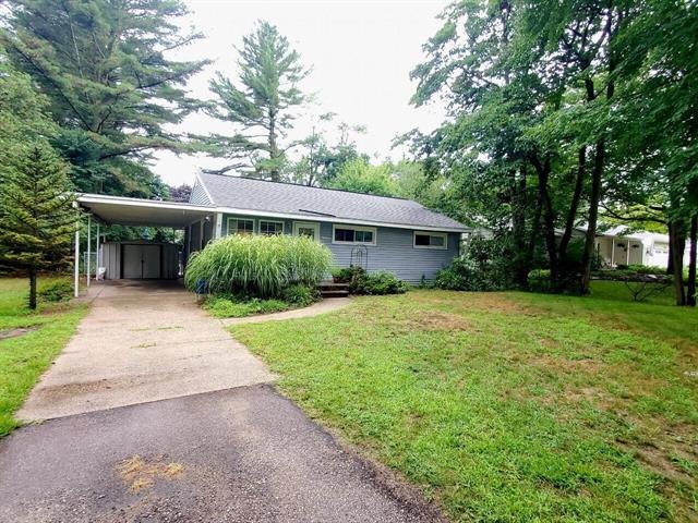 front view for 14977 Lakeshore Drive, Grand Haven, Mi. 49417