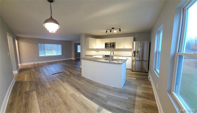 Builiding view eight for 5080 Chilson, Howell, MI. 48843