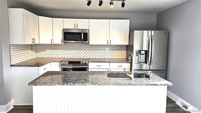 Builiding view four for 5080 Chilson, Howell, MI. 48843