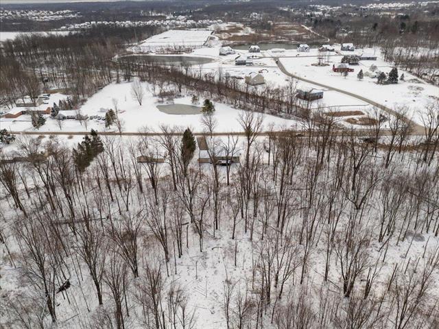 Builiding view thirty five for 56210 11 Mile, New Hudson, MI. 48165