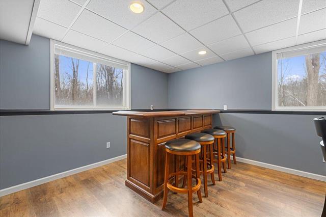 Builiding view twenty four for 56210 11 Mile, New Hudson, MI. 48165