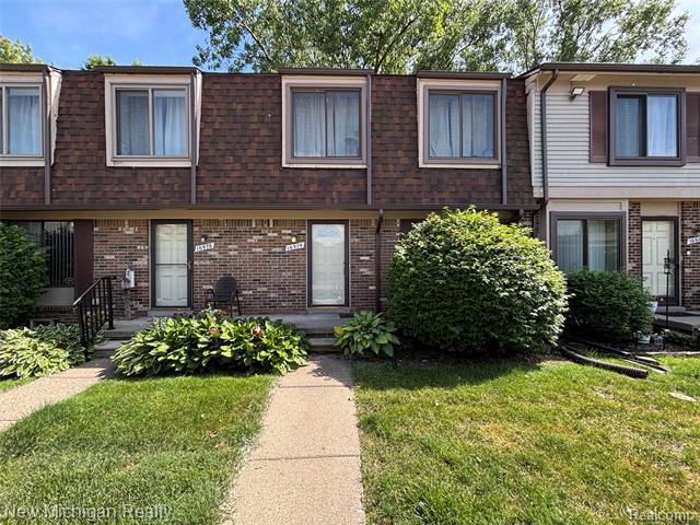 Builiding view two for 16974 Kingsbrooke Dr, Clinton Township, MI. 48038