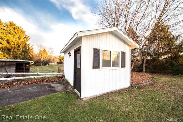 Builiding view fifty five for 4141 Van Amberg Fl 1, Brighton, MI. 48114