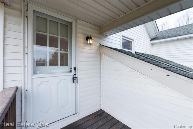 Builiding view thirty two for 4141 Van Amberg Fl 1, Brighton, MI. 48114