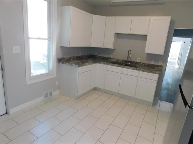 Builiding view six for 607 Kosciusko, Manistee, MI. 49660