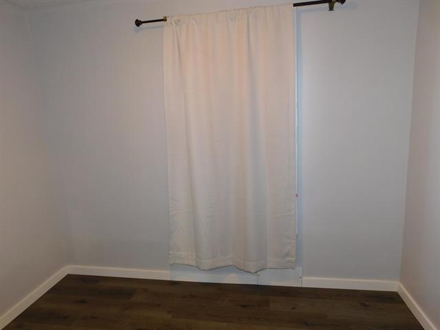 Builiding view twelve for 607 Kosciusko, Manistee, MI. 49660