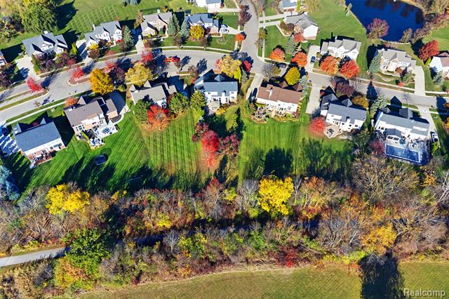 Builiding view fifty one for 1020 Carriage Trace, South Lyon, MI. 48178