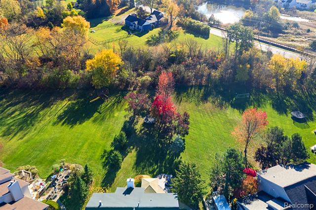 Builiding view forty nine for 1020 Carriage Trace, South Lyon, MI. 48178