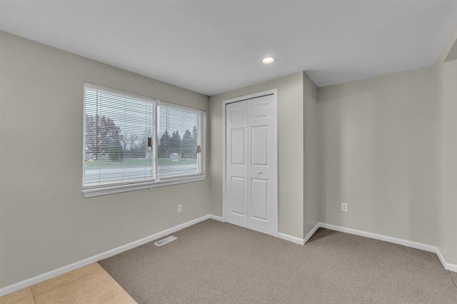 Builiding view nine for 56733 Grand River, New Hudson, MI. 48165