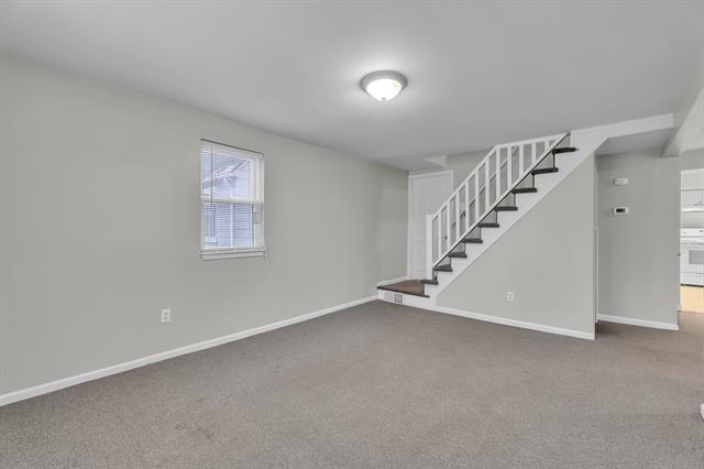 Builiding view seventeen for 56733 Grand River, New Hudson, MI. 48165