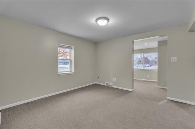 Builiding view thirteen for 56733 Grand River, New Hudson, MI. 48165