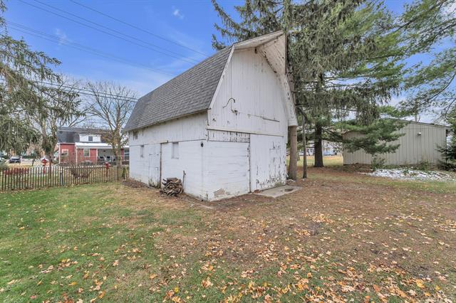 Builiding view thirty nine for 56733 Grand River, New Hudson, MI. 48165