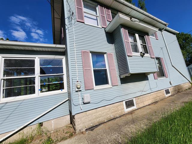 Builiding view twenty three for 213 High, Jackson, MI. 49203