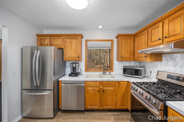 Builiding view ten for 2885 Hidden View, Caledonia, MI. 49316