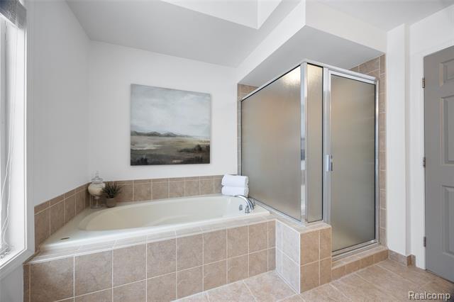 Builiding view eighteen for 57351 Blossom Valley, New Hudson, MI. 48165