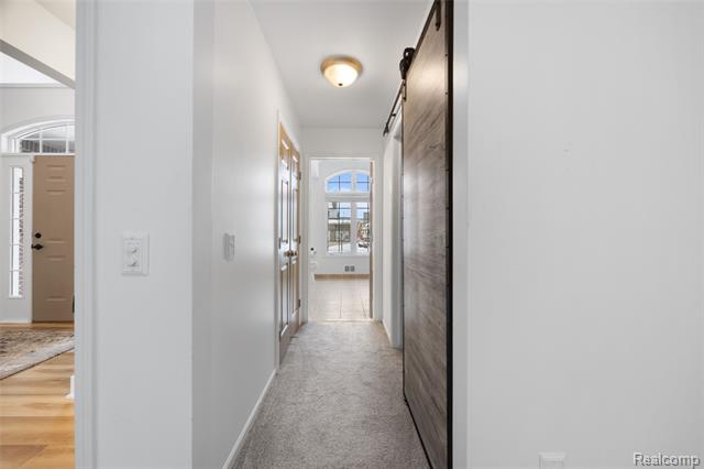 Builiding view fifteen for 57351 Blossom Valley, New Hudson, MI. 48165