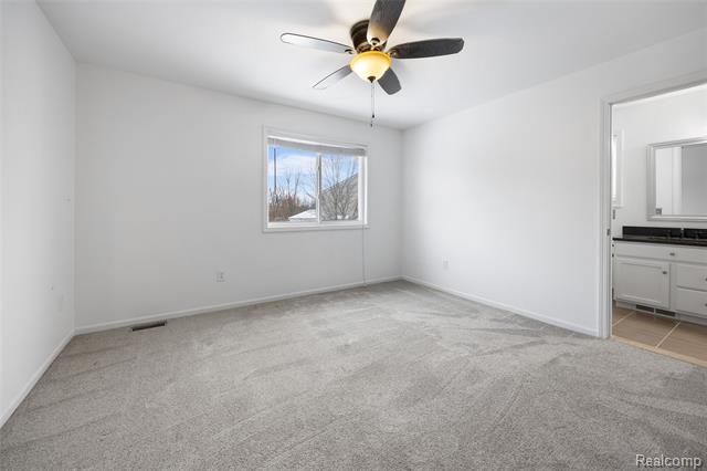 Builiding view twenty one for 57351 Blossom Valley, New Hudson, MI. 48165