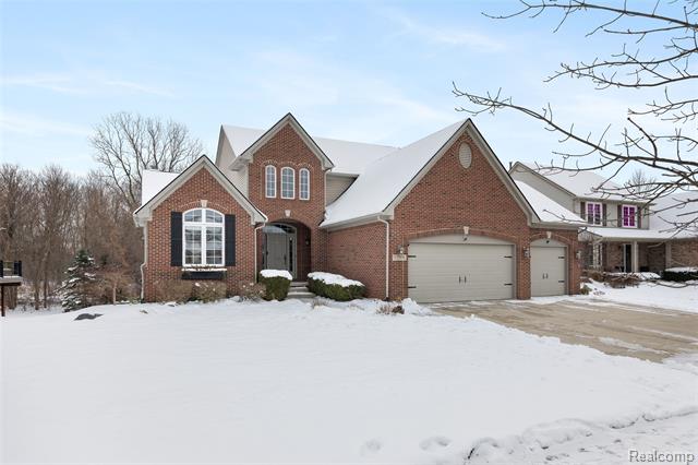 front view for 57351 Blossom Valley Trl, New Hudson, Mi. 48165