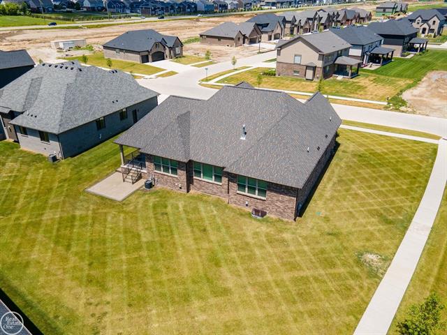 Builiding view forty for 16818 Glenhurst Drive, Macomb, MI. 48044