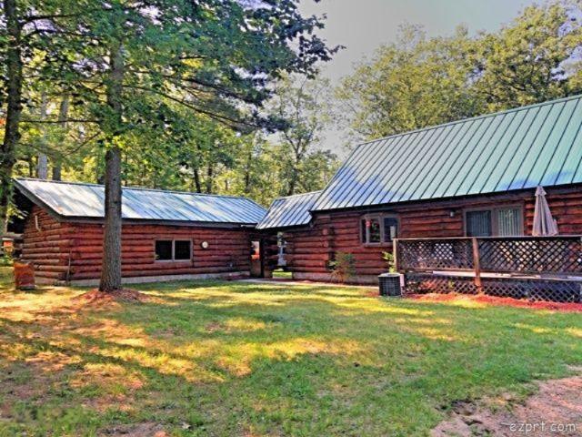 front view for 9480 S Lake Cecilia, Baldwin, Mi. 49304