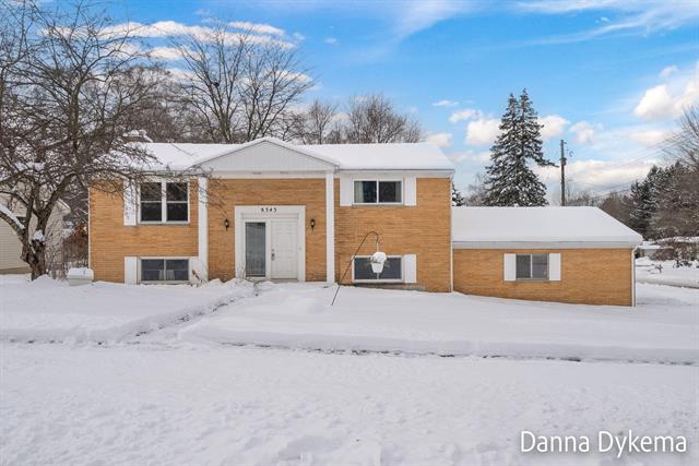 front view for 8343 Atlanta Drive Ne, Rockford, Mi. 49341