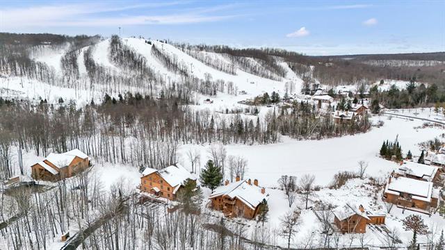 Builiding view one for 2050 Schuss Mountain Drive, Bellaire, MI. 49615