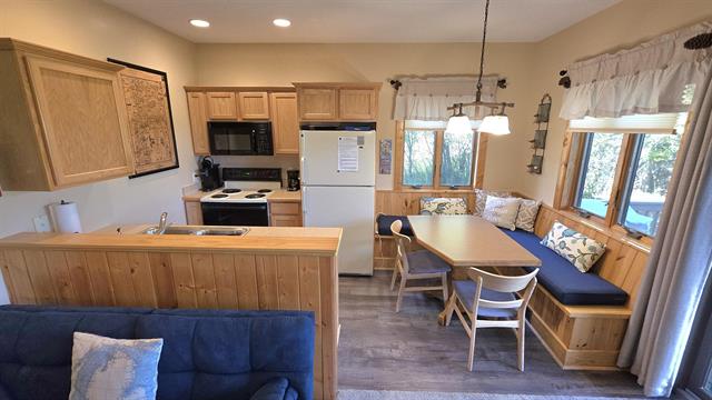 Builiding view six for 2050 Schuss Mountain Drive, Bellaire, MI. 49615