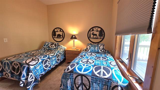 Builiding view sixteen for 2050 Schuss Mountain Drive, Bellaire, MI. 49615