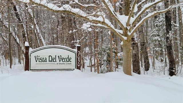 front view for 2050 W Schuss Mountain Drive, Bellaire, Mi. 49615