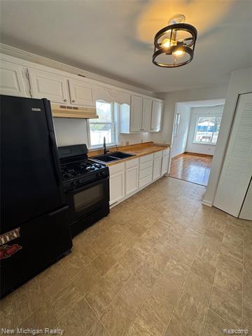 Builiding view thirteen for 1238 Genesee, Burton, MI. 48509