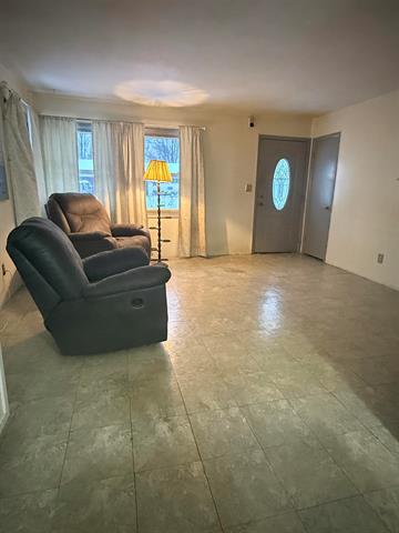 Builiding view seven for 704 Isham St., Owosso, MI. 48867